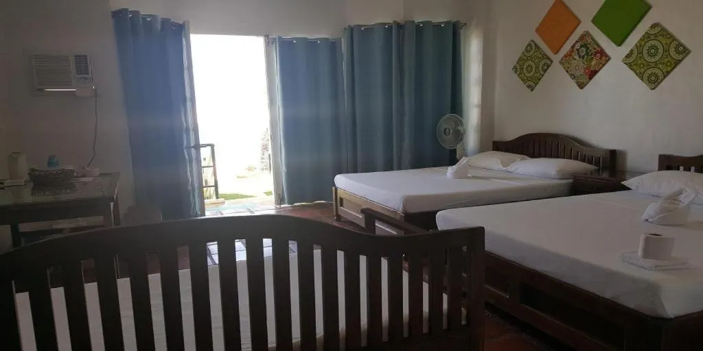 Bed in Blue Ocean Bohol Beachfront