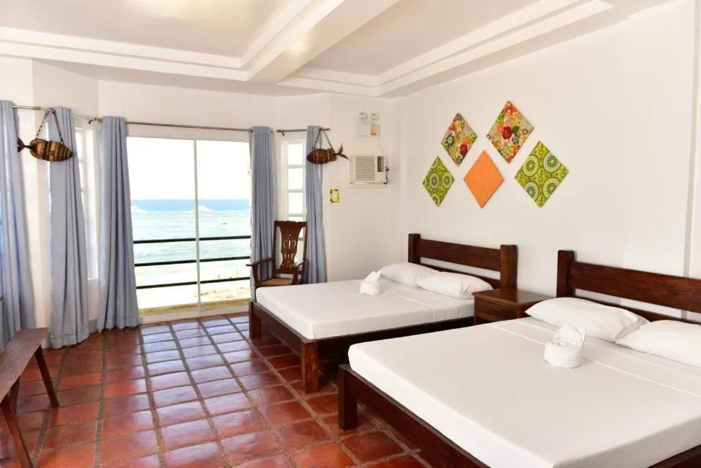 Bed in Blue Ocean Bohol Beachfront