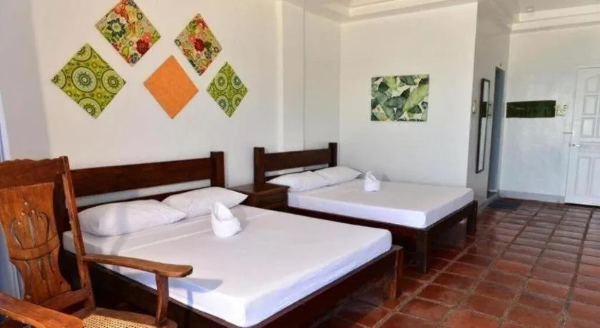 Bed in Blue Ocean Bohol Beachfront