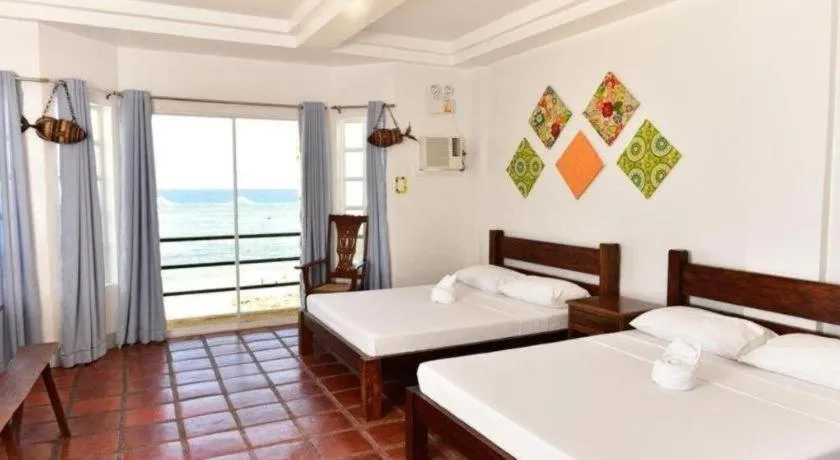 Bed in Blue Ocean Bohol Beachfront