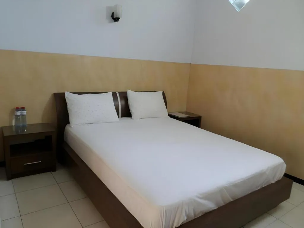 Bed in Hotel Cendrawasih