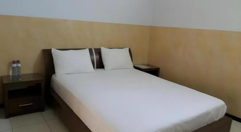 Bed in Hotel Cendrawasih