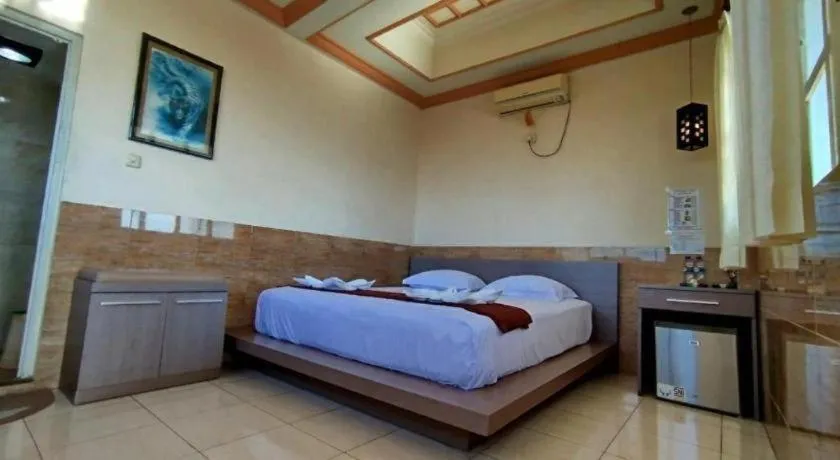 Bed in Hotel Cendrawasih