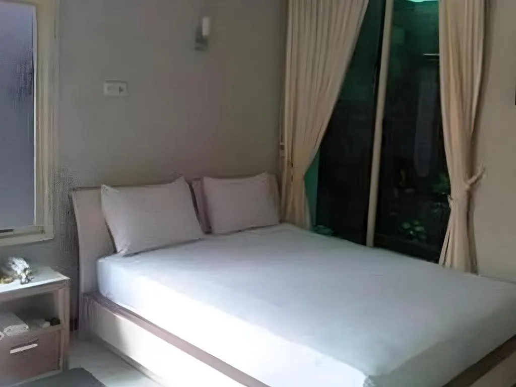 Bed in Hotel Cendrawasih