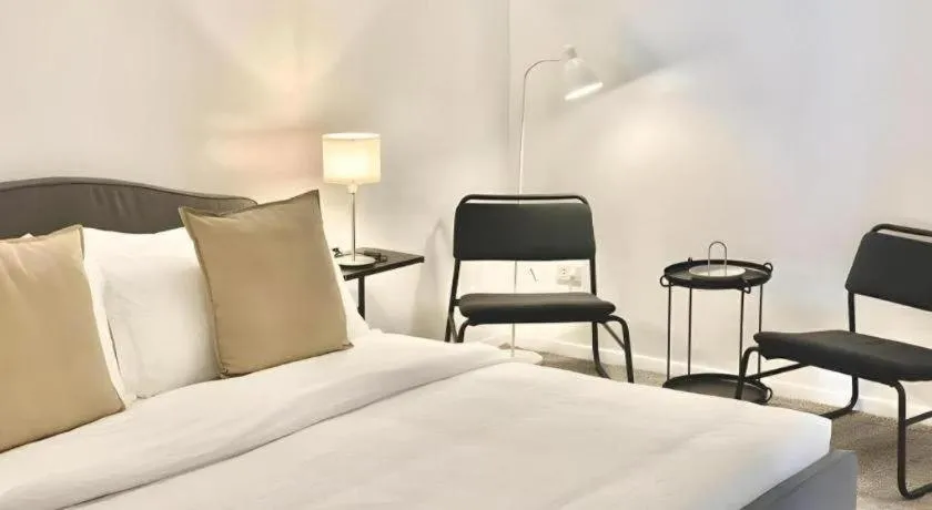 Bed in Steps Garden Resort