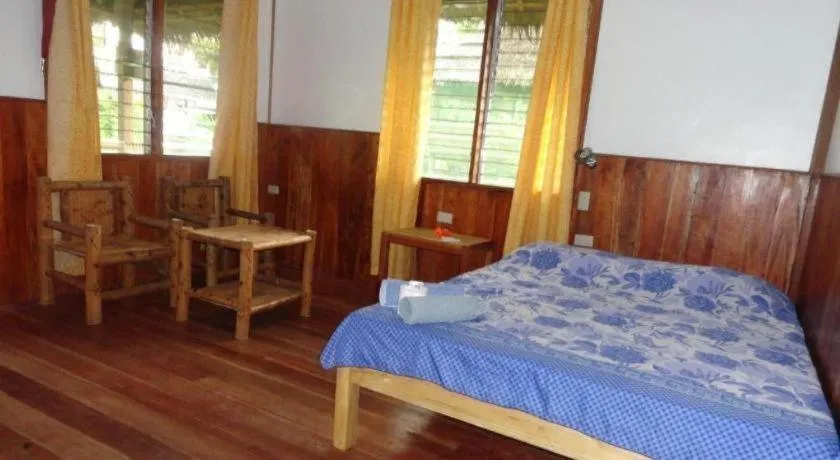 Bed in Mayas Native Garden Resort