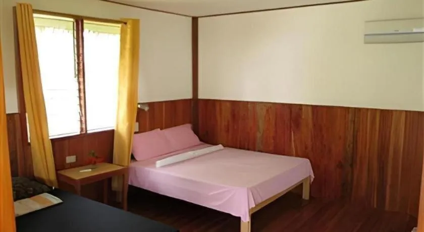 Bed in Mayas Native Garden Resort