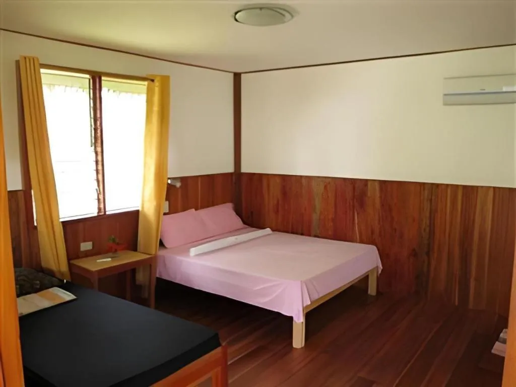 Bed in Mayas Native Garden Resort