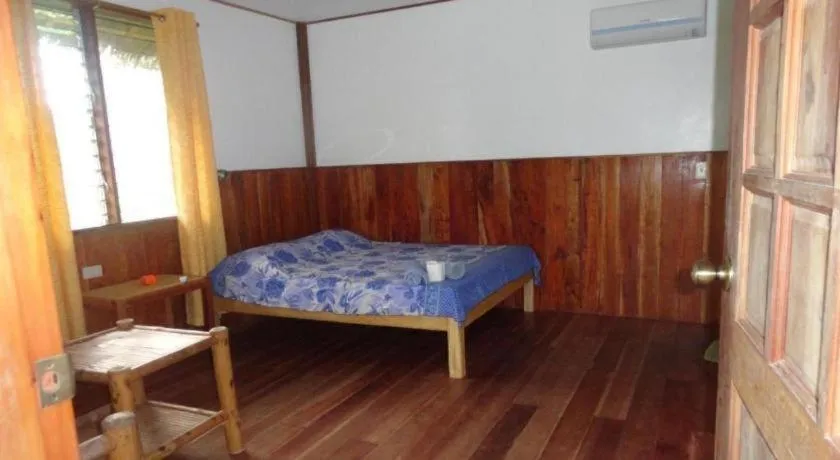 Bed in Mayas Native Garden Resort