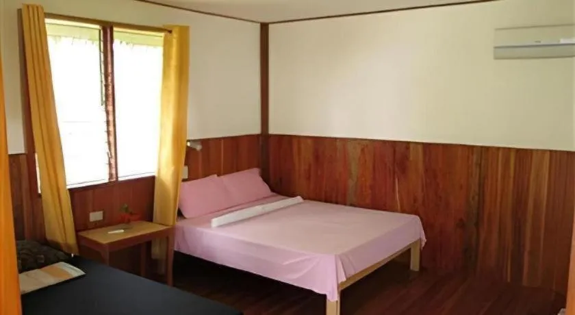 Bed in Mayas Native Garden Resort