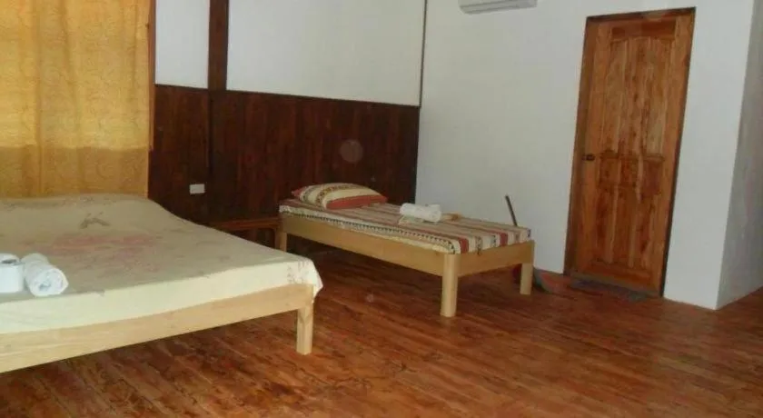 Bed in Mayas Native Garden Resort