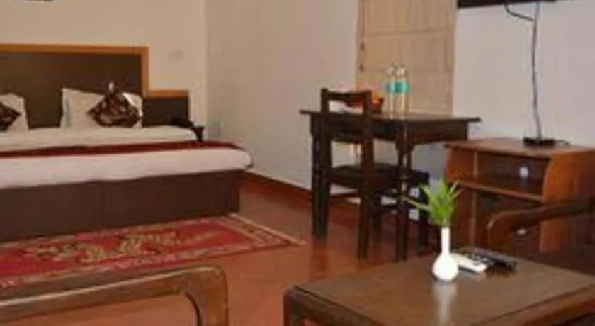 Bed in Pratiksha River Retreat