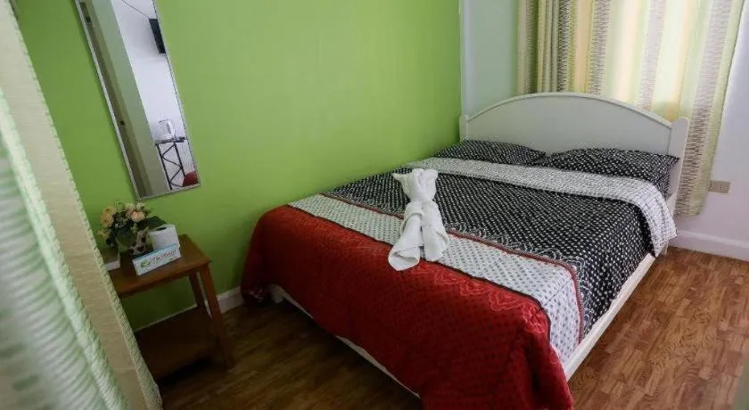 Bed in Villa Soledad Beach Resort