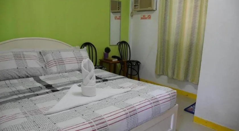 Bed in Villa Soledad Beach Resort