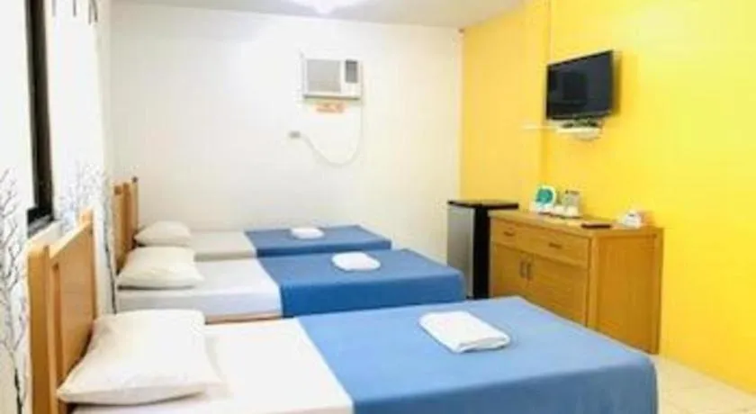 Bed in Villa Soledad Beach Resort