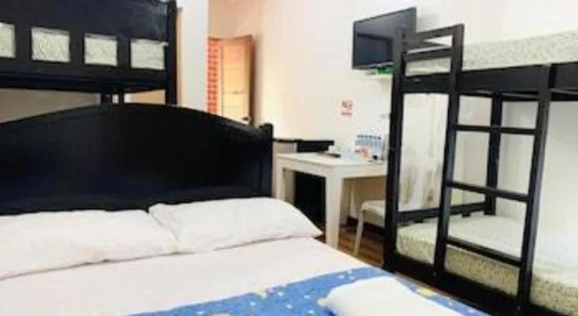 Bed in Villa Soledad Beach Resort