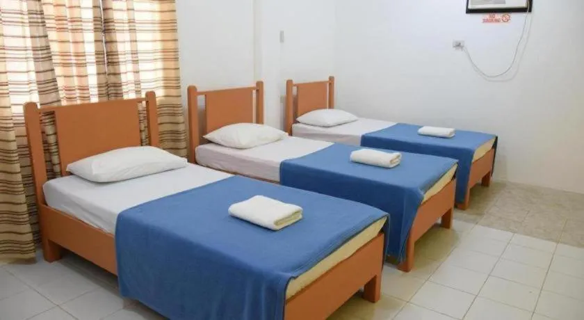 Bed in Villa Soledad Beach Resort