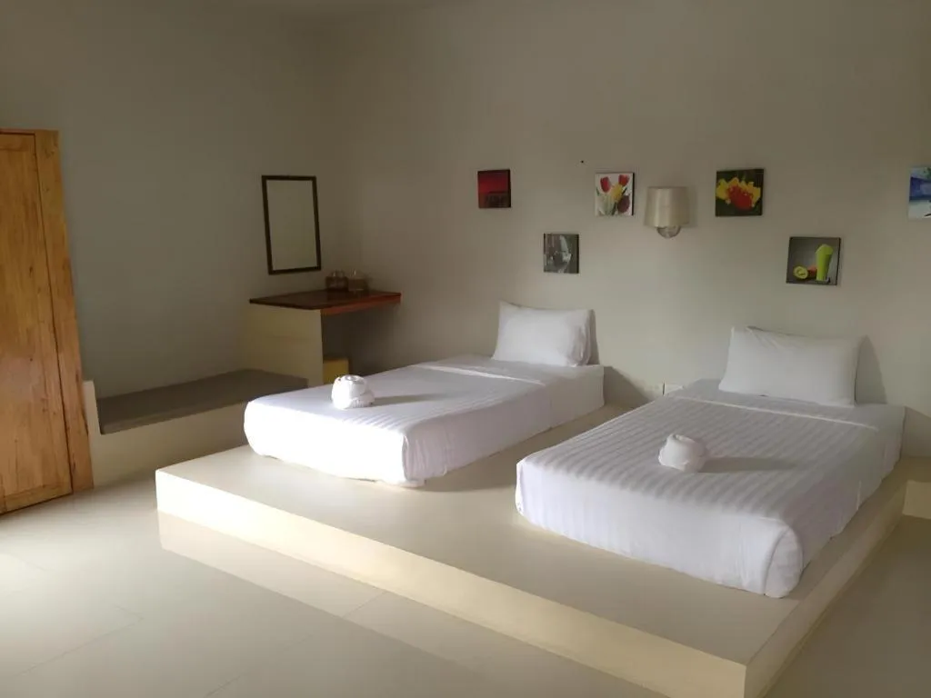 Bed in Baan Pan Din Resort