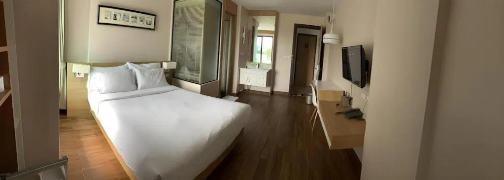 Bed in Coco Beach Resort