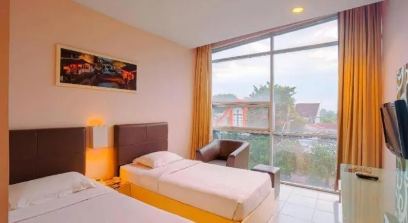 Bed in Royal Hotel n' Lounge