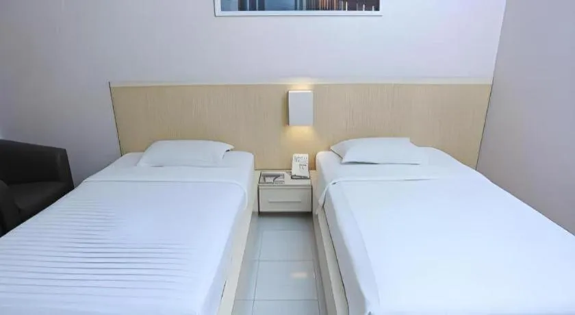 Bed in Royal Hotel n' Lounge