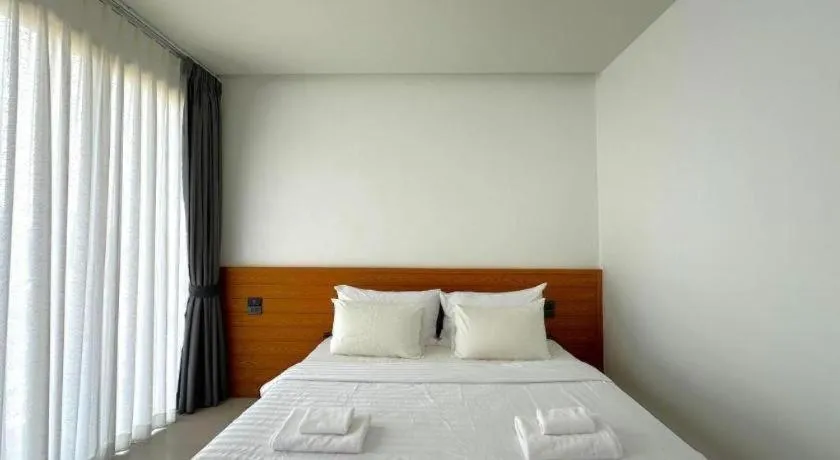 Bed in Chaolao Sea Breeze Resort