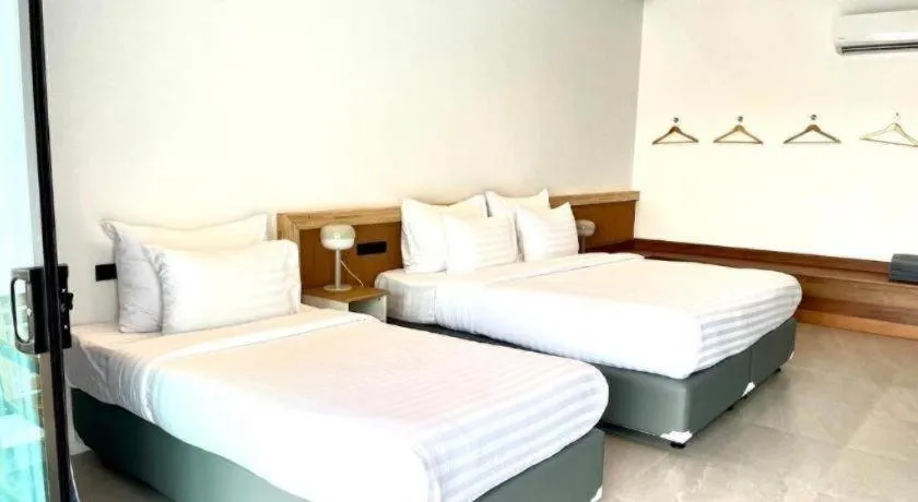 Bed in Chaolao Sea Breeze Resort