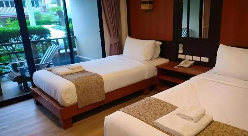 Bed in La Playa Boutique Resort