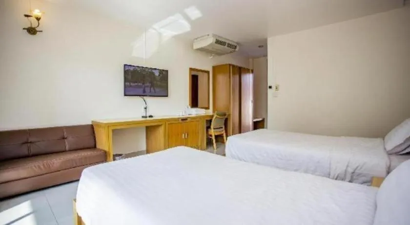 Bed in Zen Garden Resort