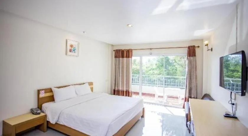 Bed in Zen Garden Resort