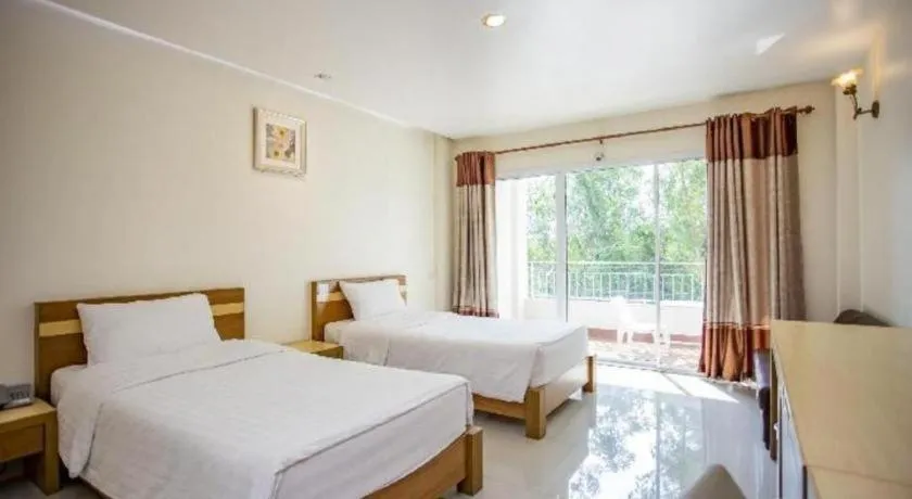 Bed in Zen Garden Resort