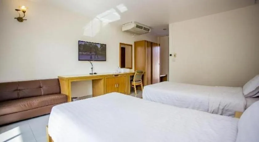 Bed in Zen Garden Resort