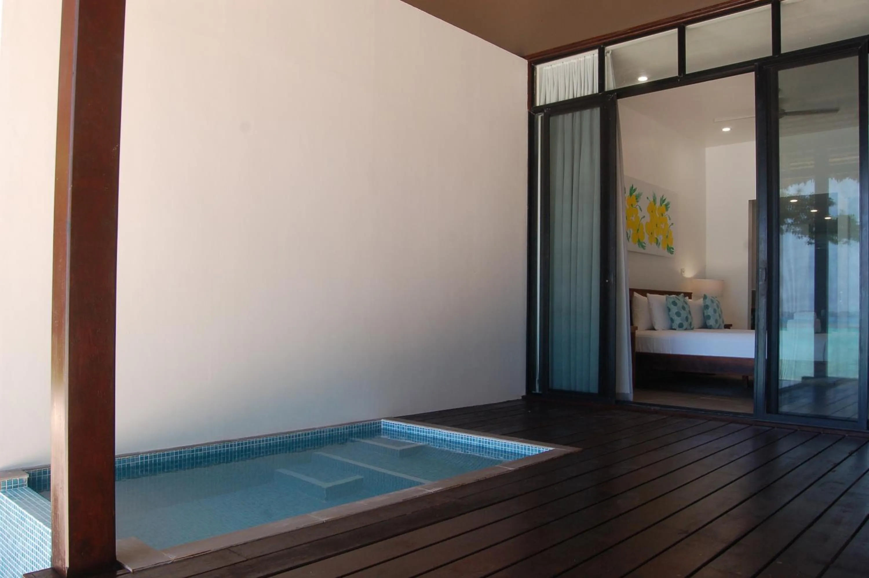 Bed in Barrier Beach Resort