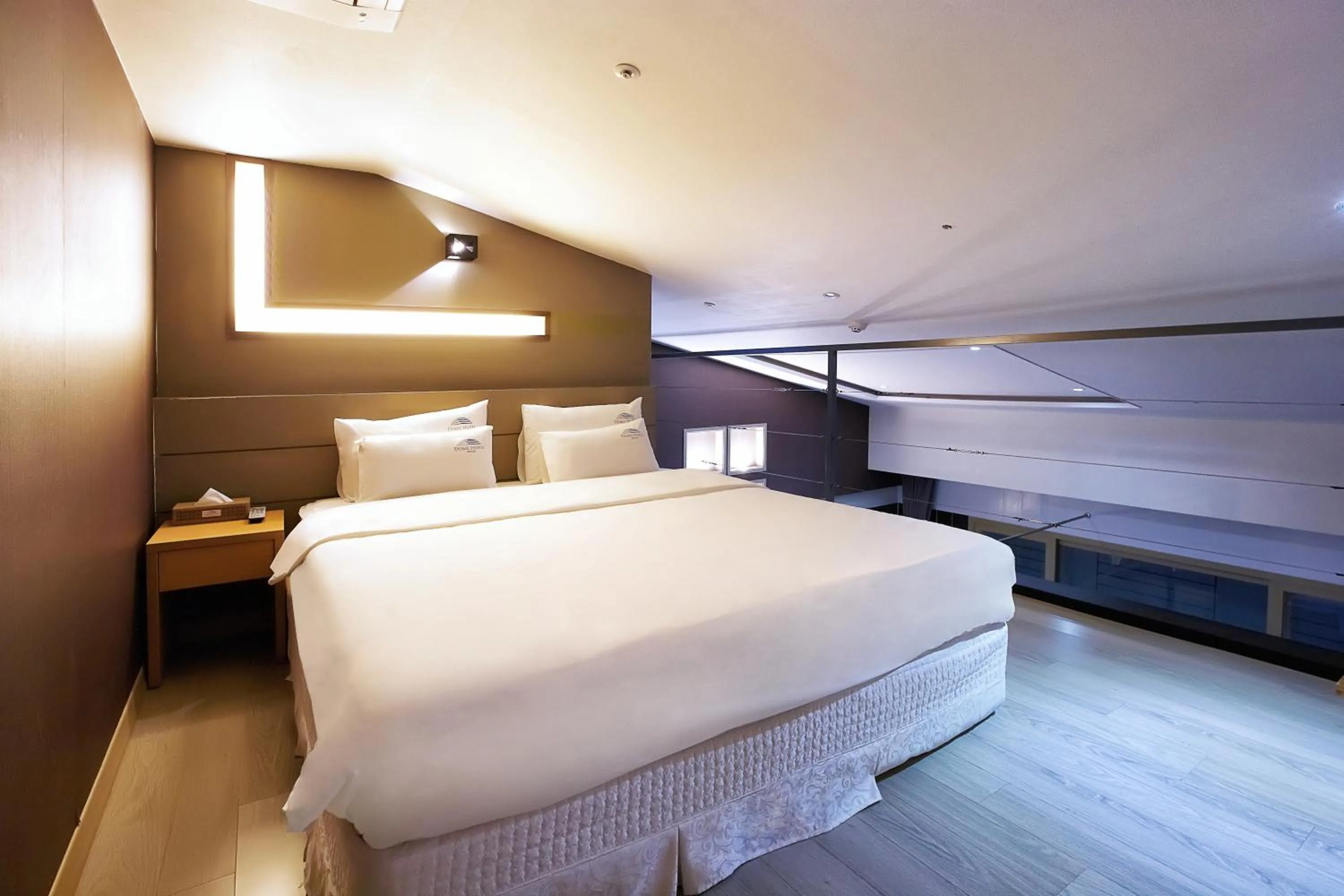 Bed in Dome Hotel Geoje