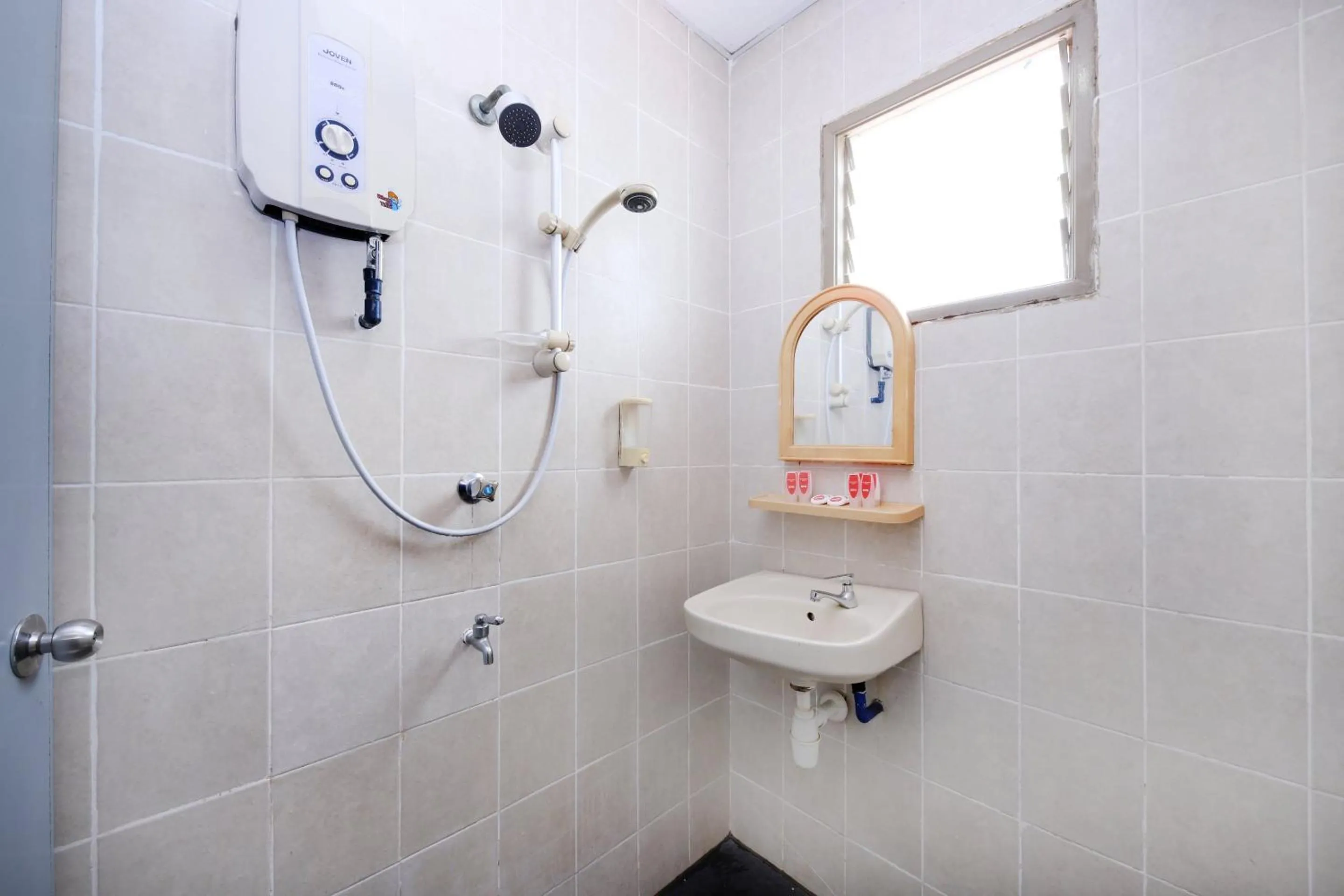 Bathroom in Collection O Batu Ferringhi Beach formerly ESQ Ferringhi