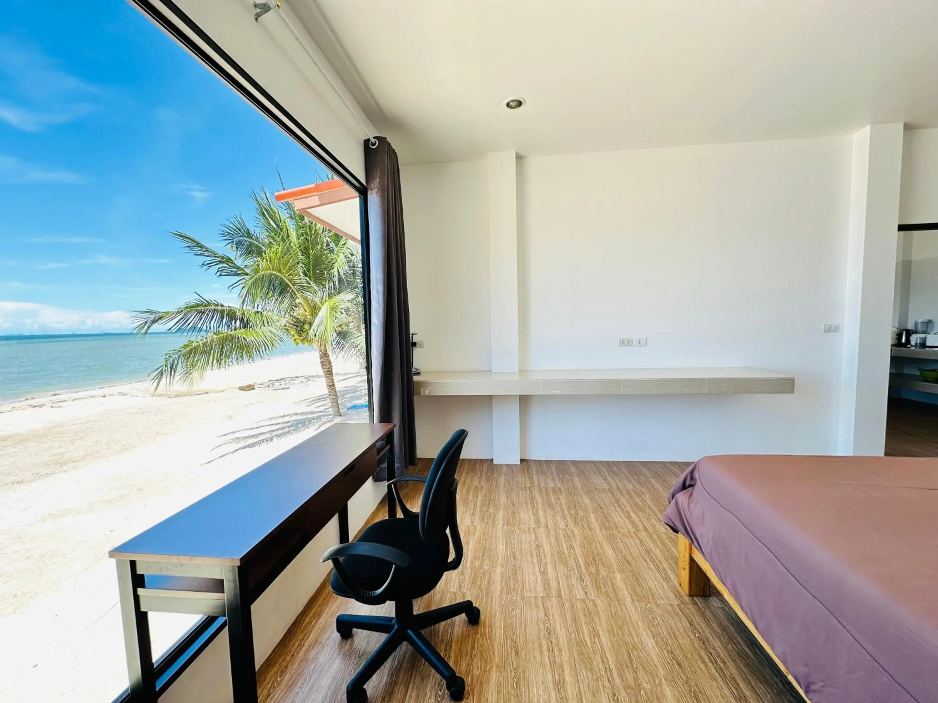 Bed in The Scenery Beach Resort