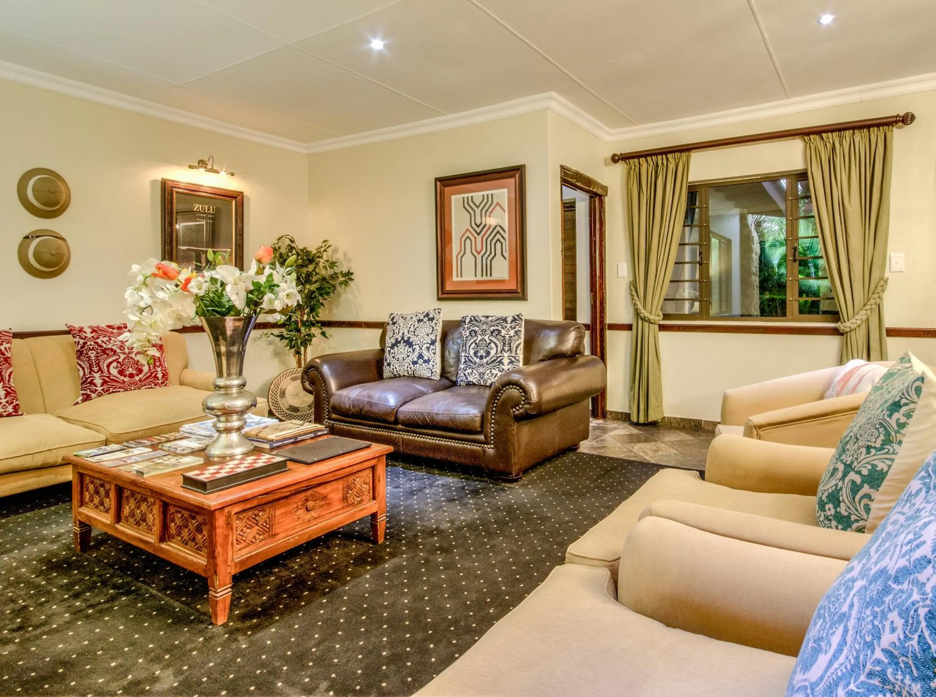 Communal lounge/ TV room in At Heritage House