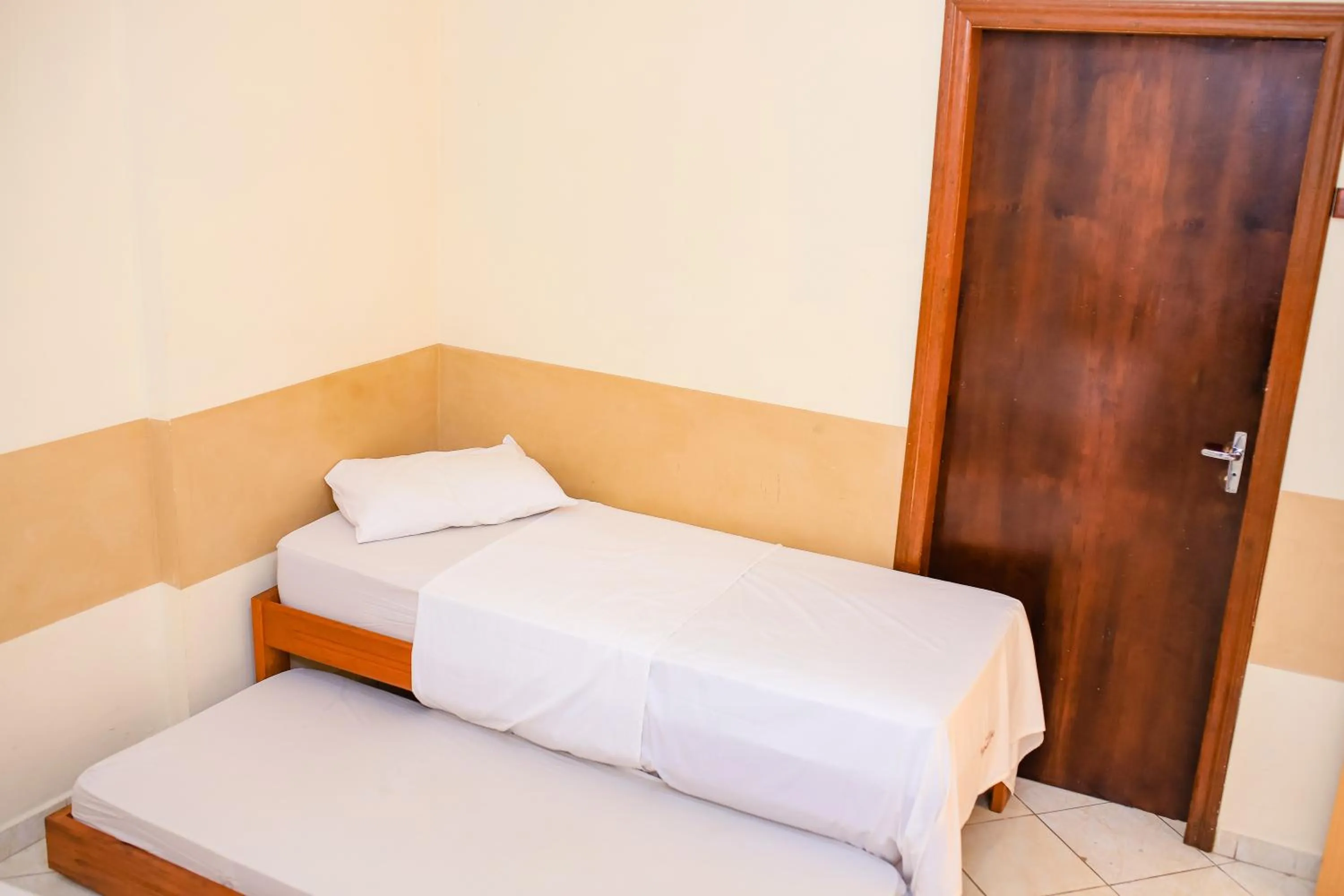 Bed in Pousada Santa Cruz