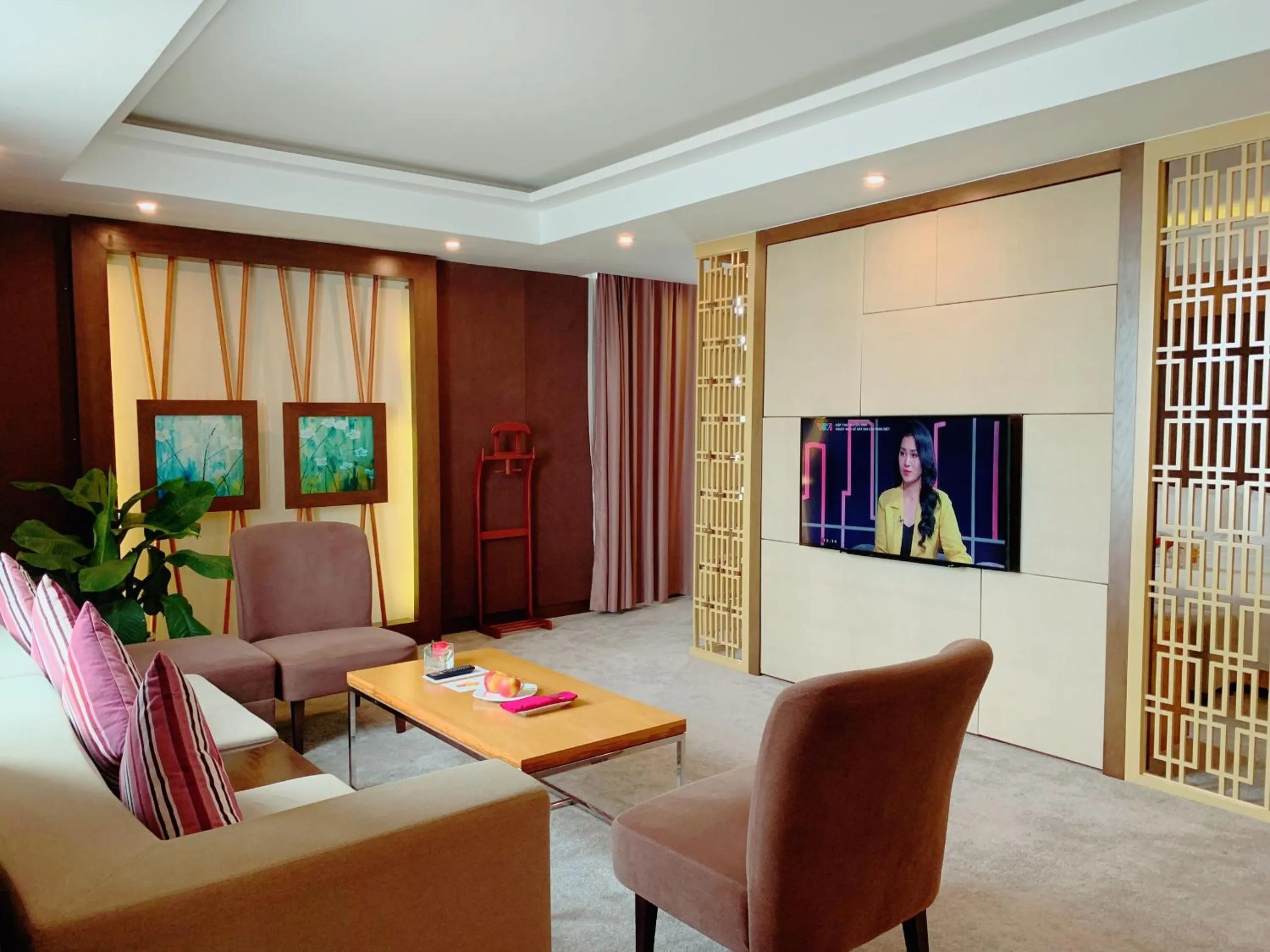 Living room in Muong Thanh Luxury Nhat Le Hotel