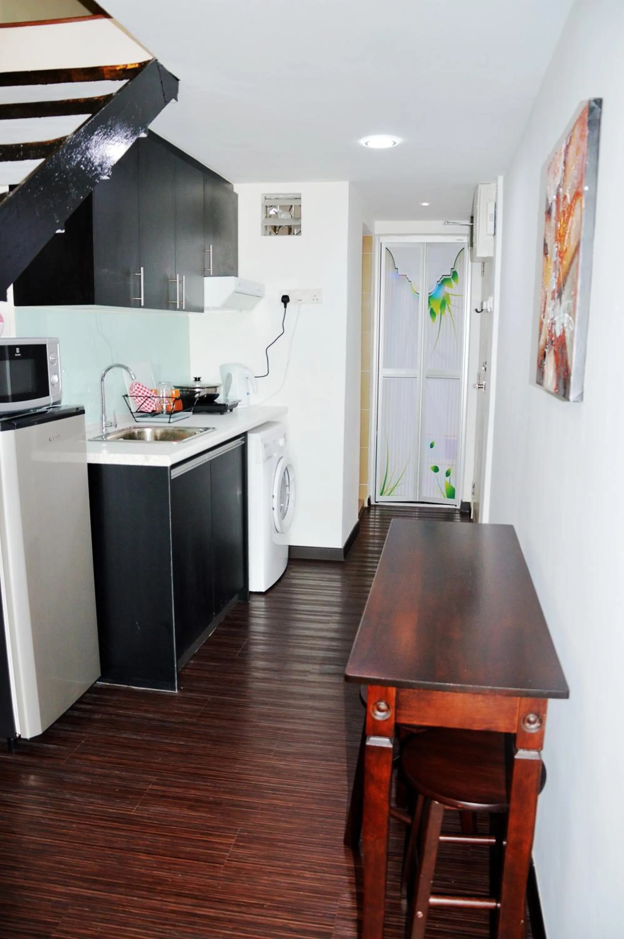 Kitchen or kitchenette in Taragon Residences