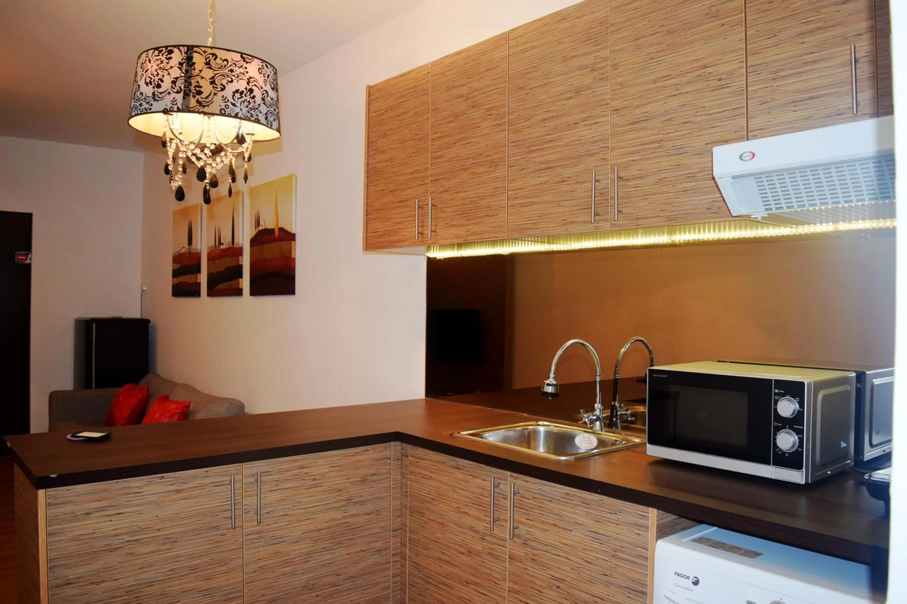 Kitchen or kitchenette in Taragon Residences
