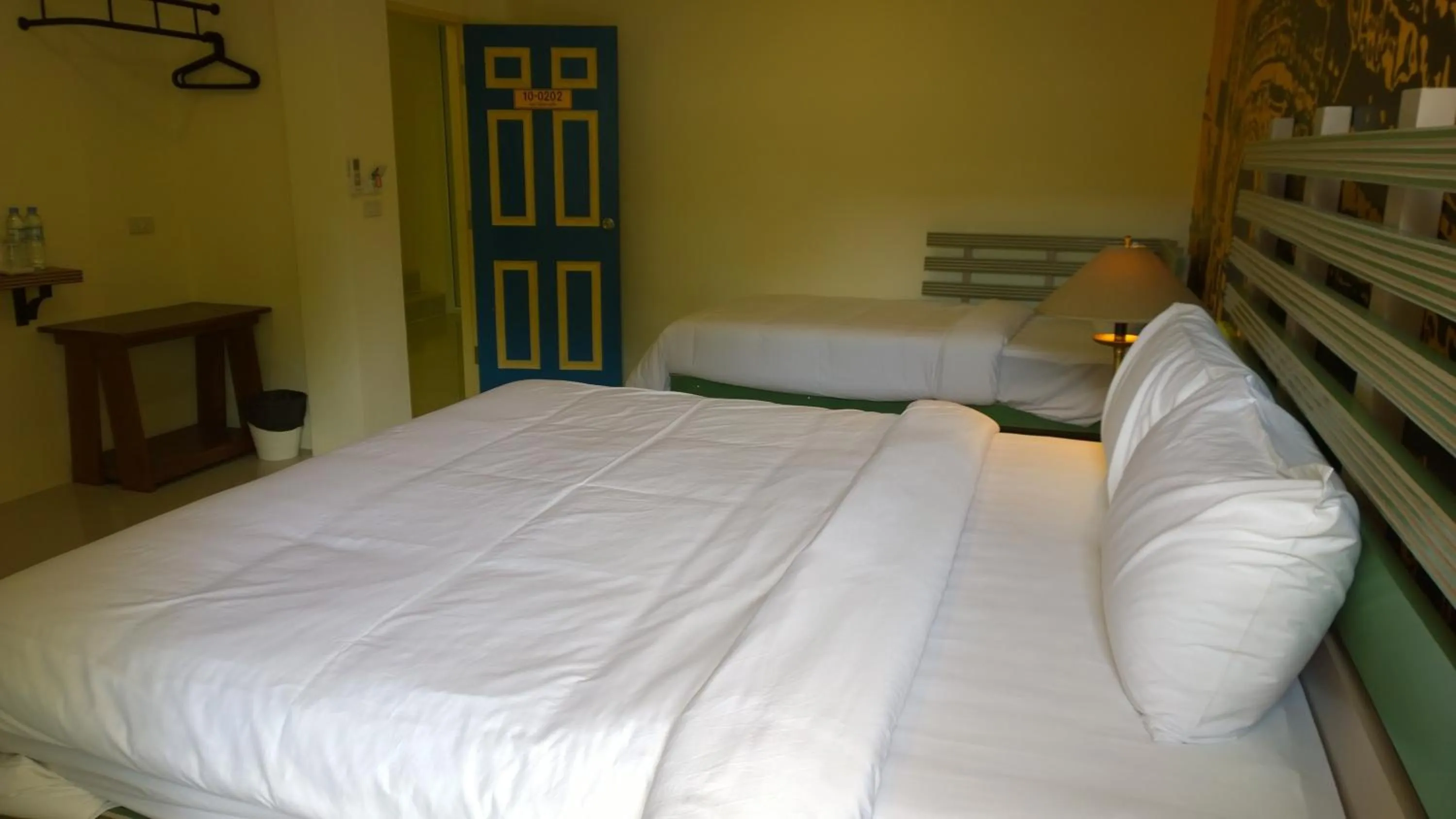 Photo of the whole room, Bed in The Pho Thong Phuket