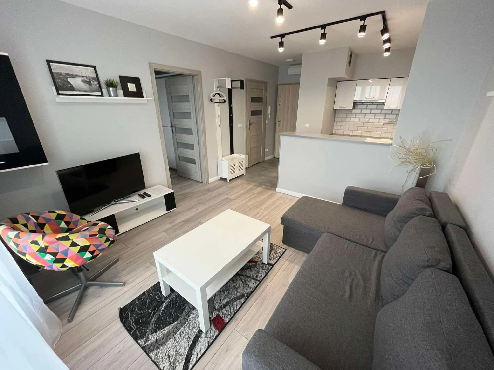 Communal lounge/ TV room in Apartamenty Residence Aparthotel