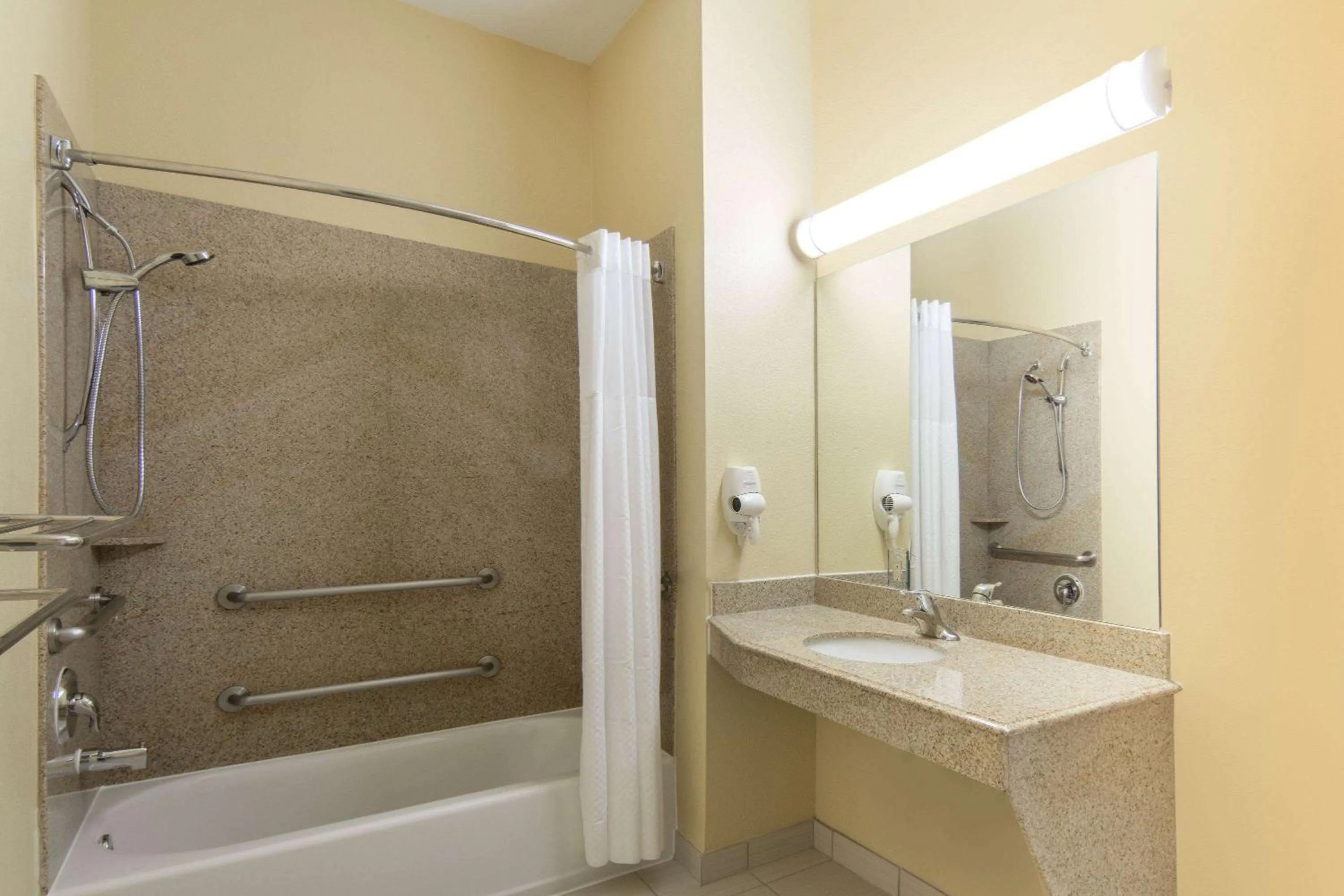 Bathroom in Days Inn by Wyndham Baytown East