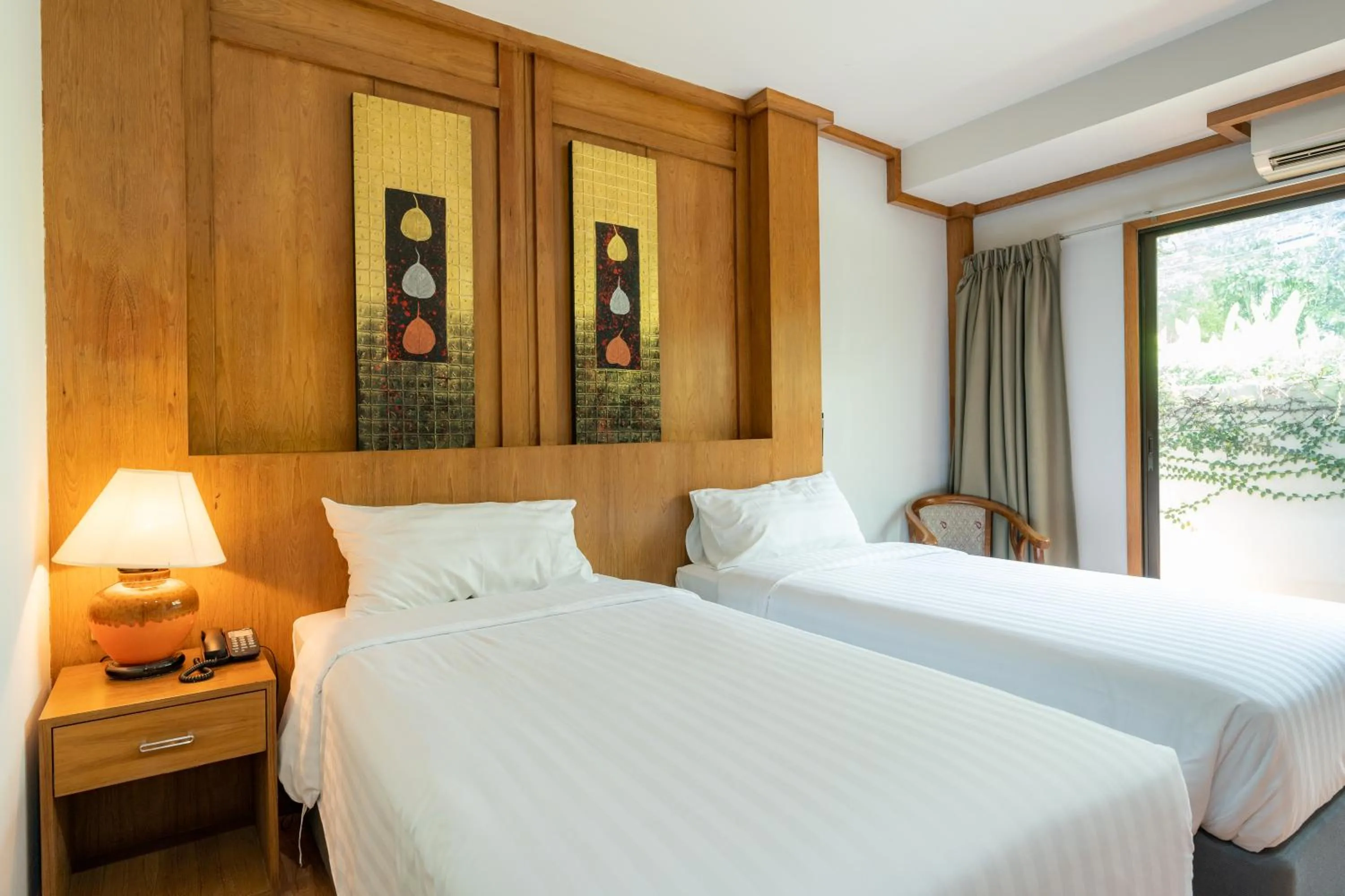Bed in Chabana Resort Bang-tao Beach Phuket- SHA Extra Plus