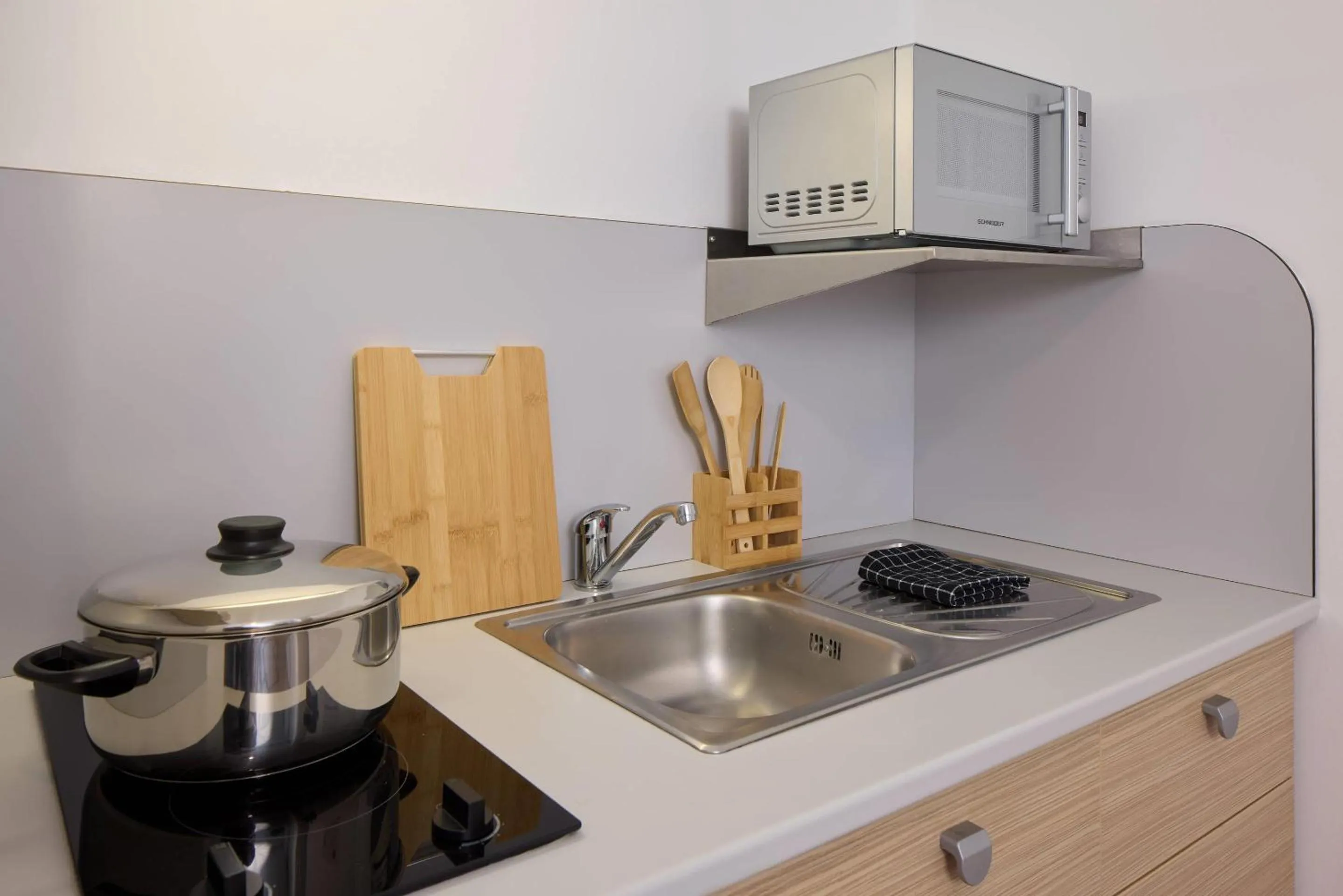 Kitchen or kitchenette in Quality Aparthotel Valenciennes