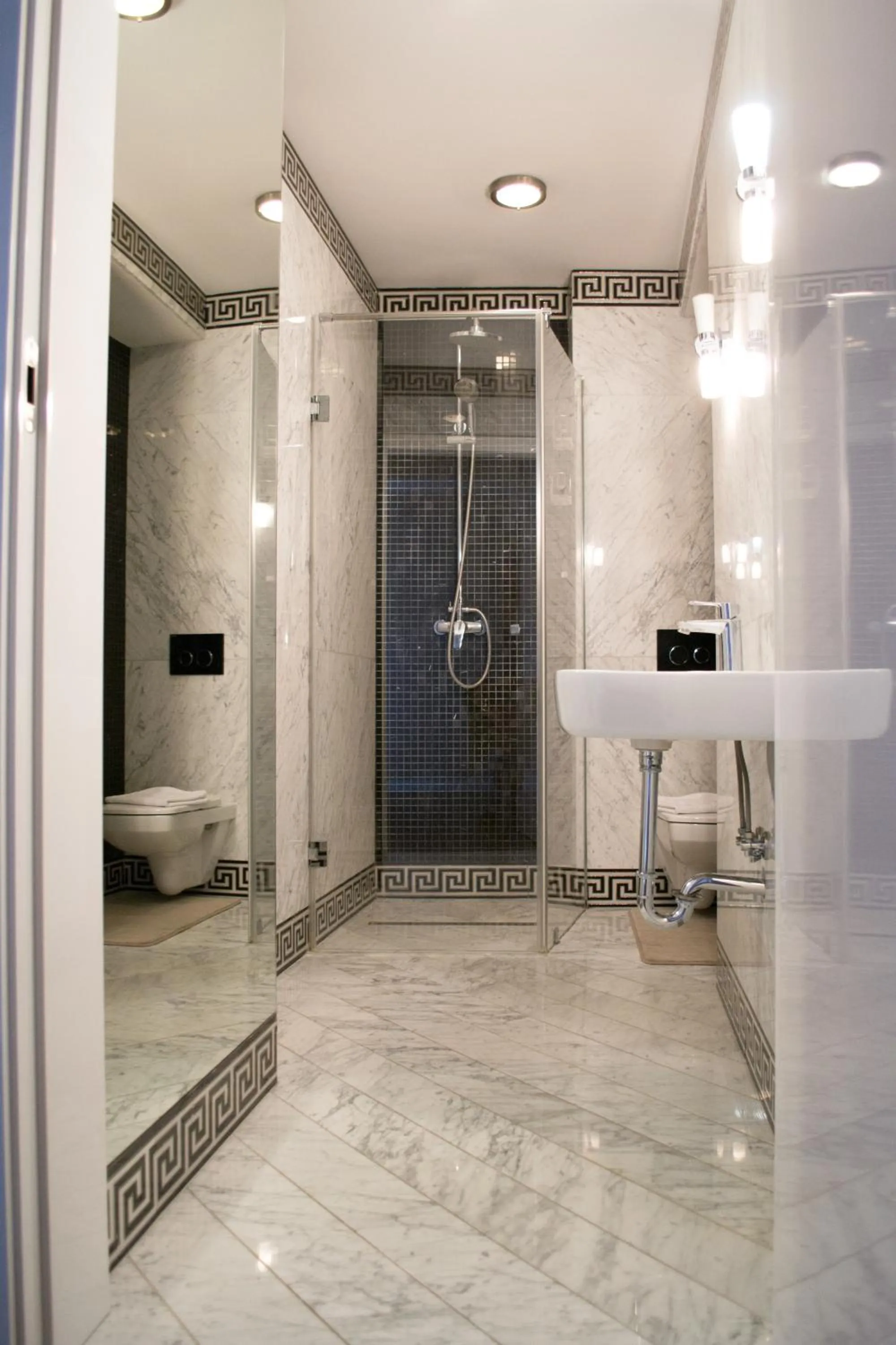 Bathroom in Komturia Old Town by Fahrenheit