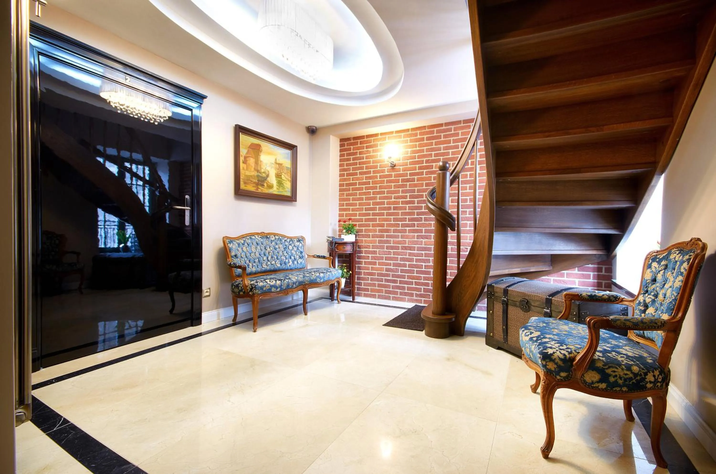 Lobby or reception in Komturia Old Town by Fahrenheit