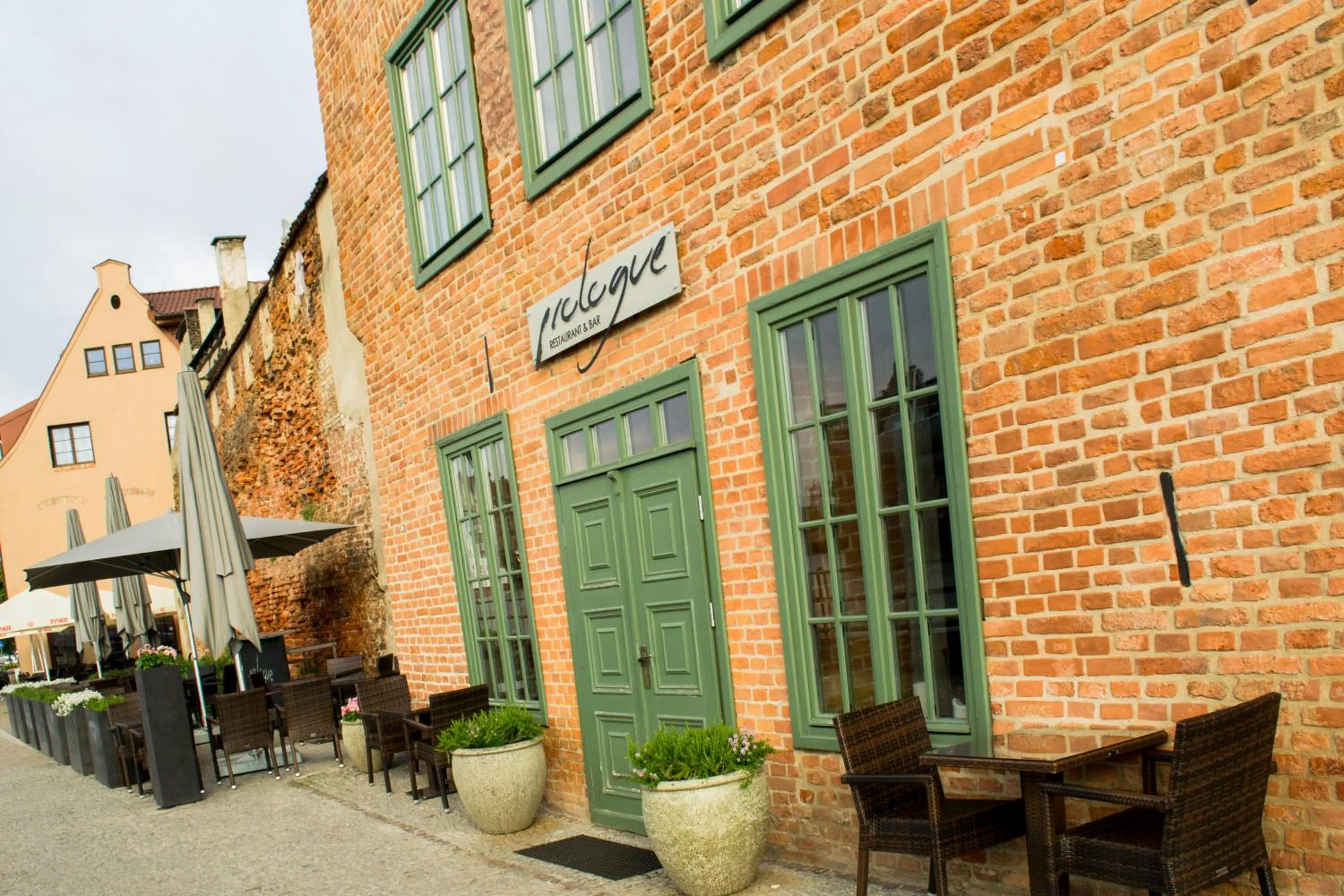 Property building in Komturia Old Town by Fahrenheit