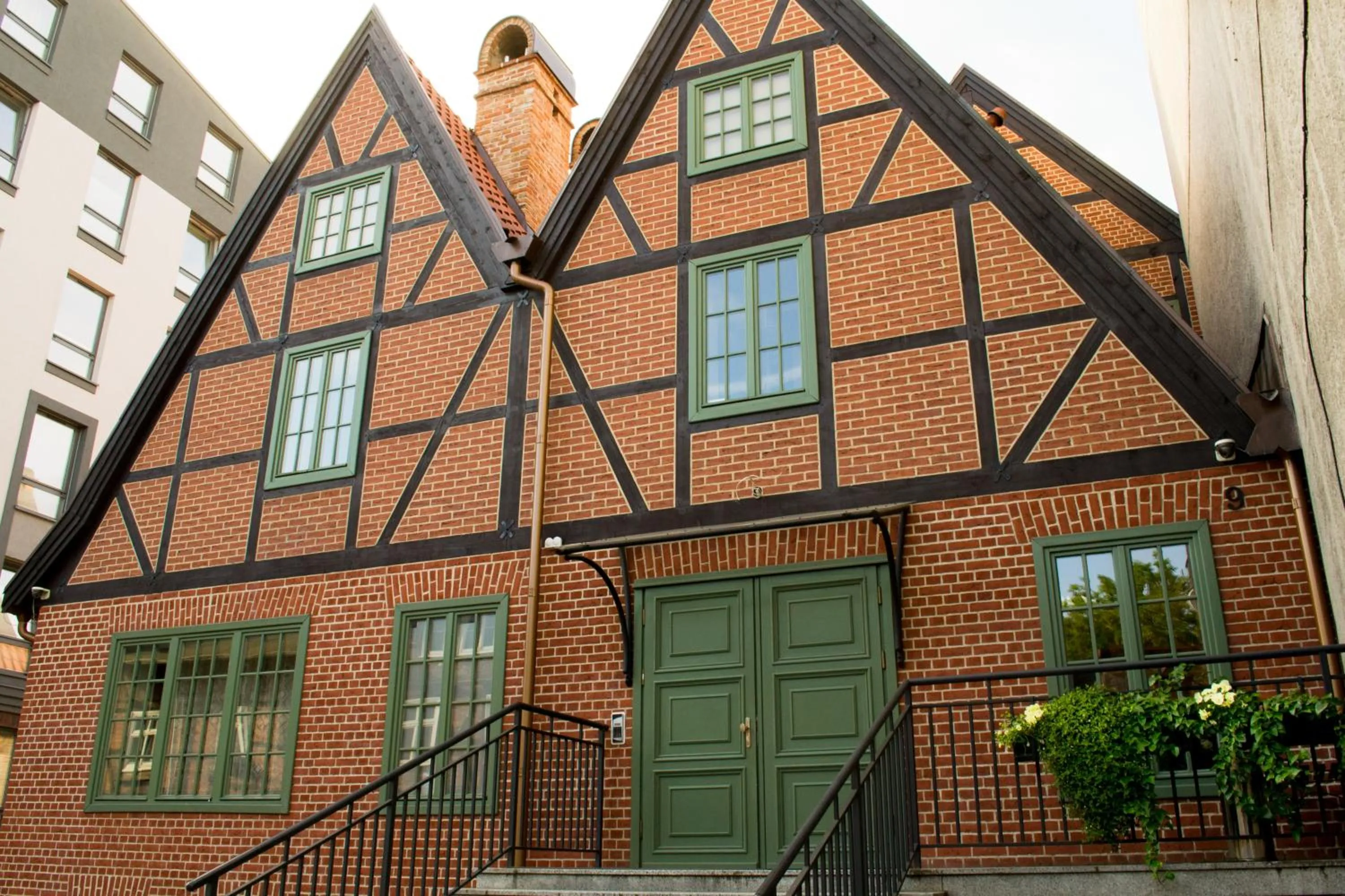 Property building in Komturia Old Town by Fahrenheit